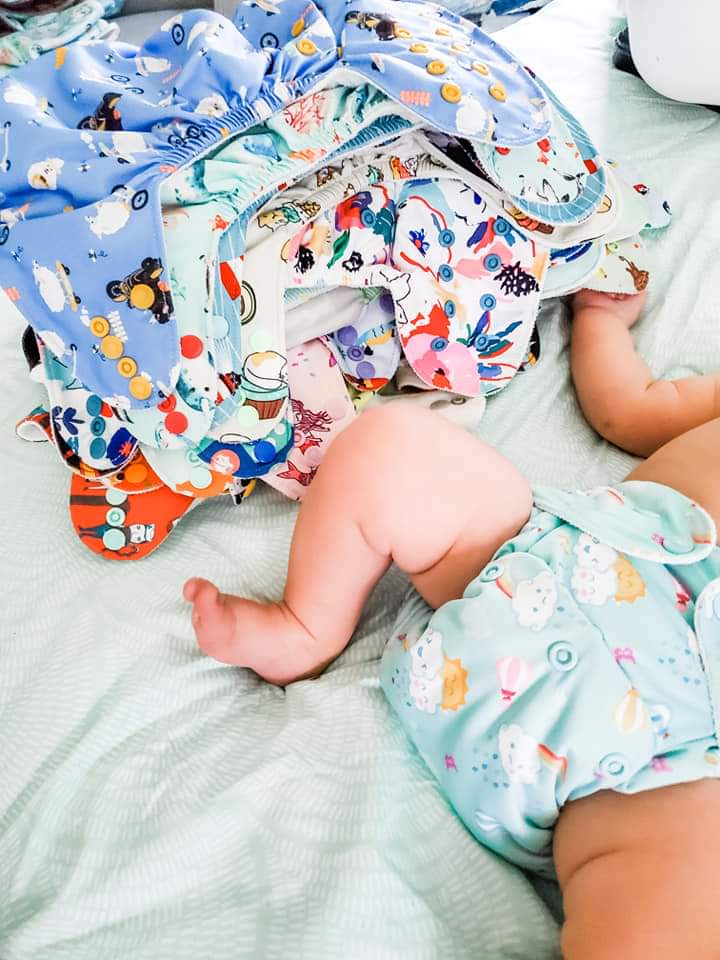 extended cloth diapers with baby laying down