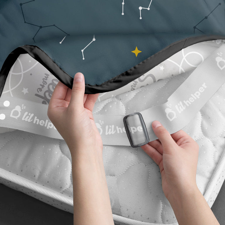 Hands adjusting Mattress Protector Stellar